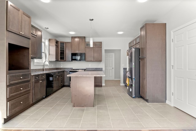 kitchen with a center island, black appliances, sink, hanging light fixtures, and light tile patterned flooring