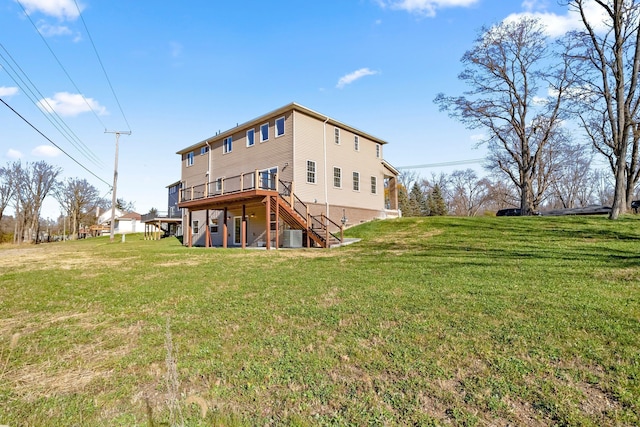 back of house with central AC unit, a lawn, and a wooden deck