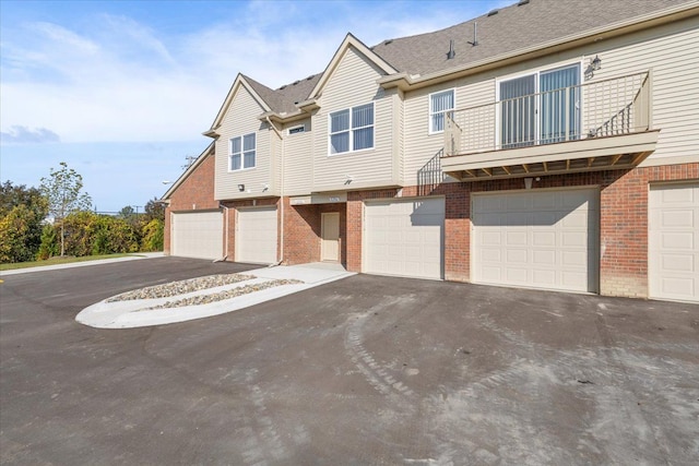 view of front of property with a balcony