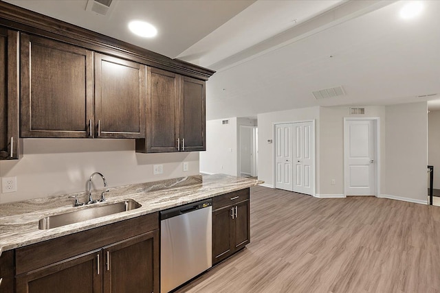 kitchen featuring dark brown cabinets, light hardwood / wood-style floors, stainless steel dishwasher, and sink