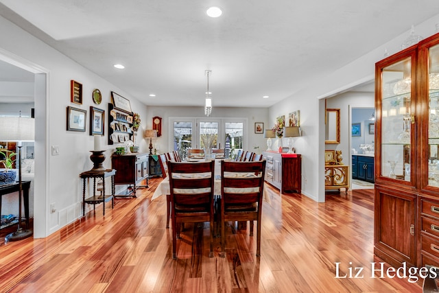 dining space featuring light hardwood / wood-style flooring