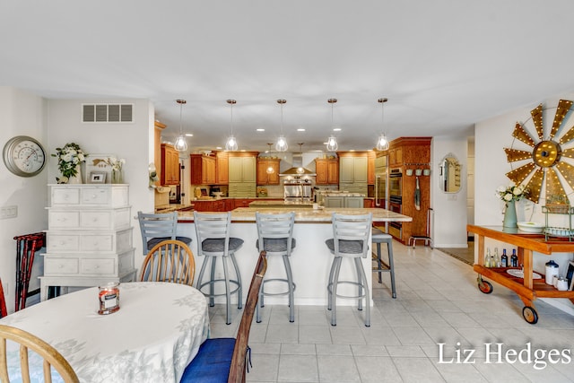 view of tiled dining space