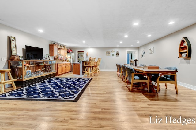 dining room with light hardwood / wood-style floors