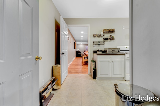 corridor featuring light hardwood / wood-style flooring