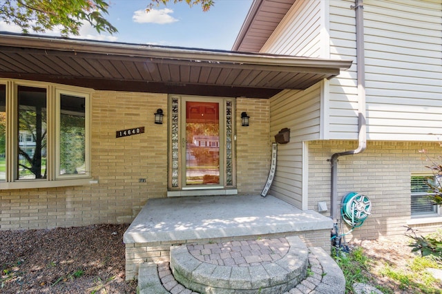 doorway to property with a porch