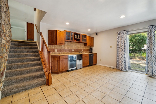 kitchen with light tile patterned floors, backsplash, and wine cooler