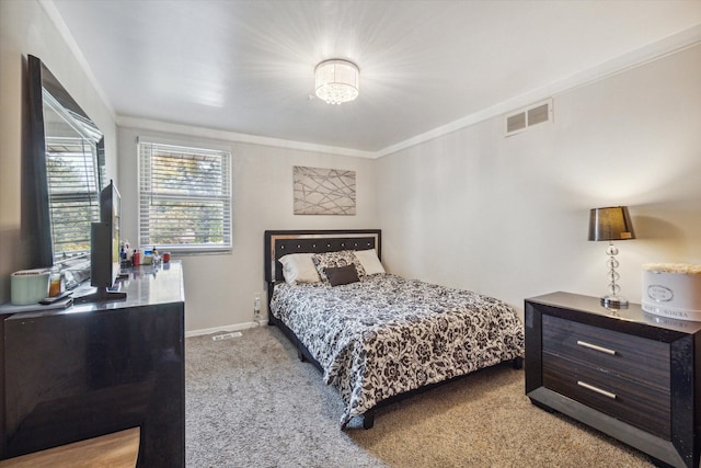 carpeted bedroom featuring ornamental molding