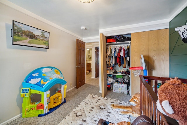 bedroom with carpet floors and a closet