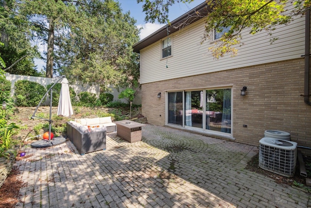 view of patio / terrace with an outdoor hangout area and central air condition unit