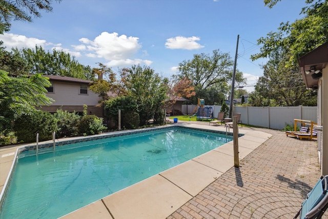 view of pool featuring a patio area