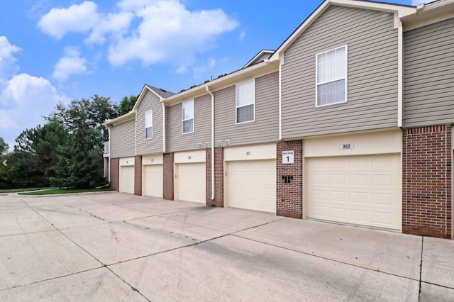 view of home's exterior with a garage