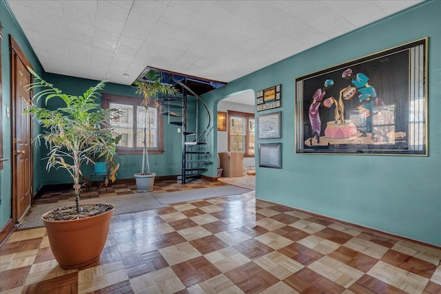 1449 Wayburn St, Grosse Pointe, MI 48230 - interior space featuring baseboards, stairway, and arched walkways