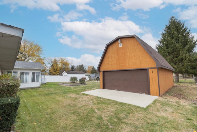 garage with a lawn