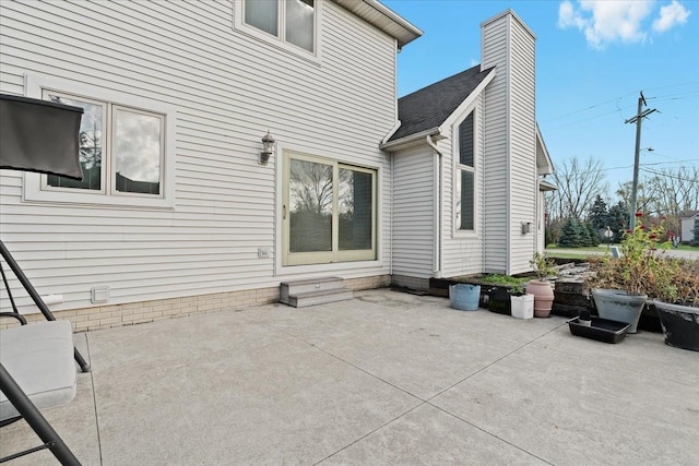 back of property with a patio area