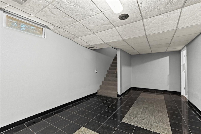 basement with a drop ceiling