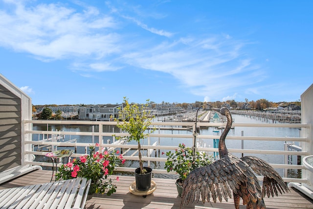 balcony featuring a water view