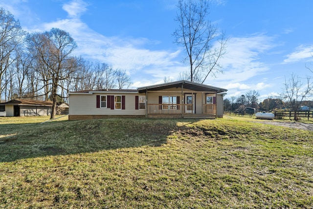 view of front of house featuring a porch and a front yard