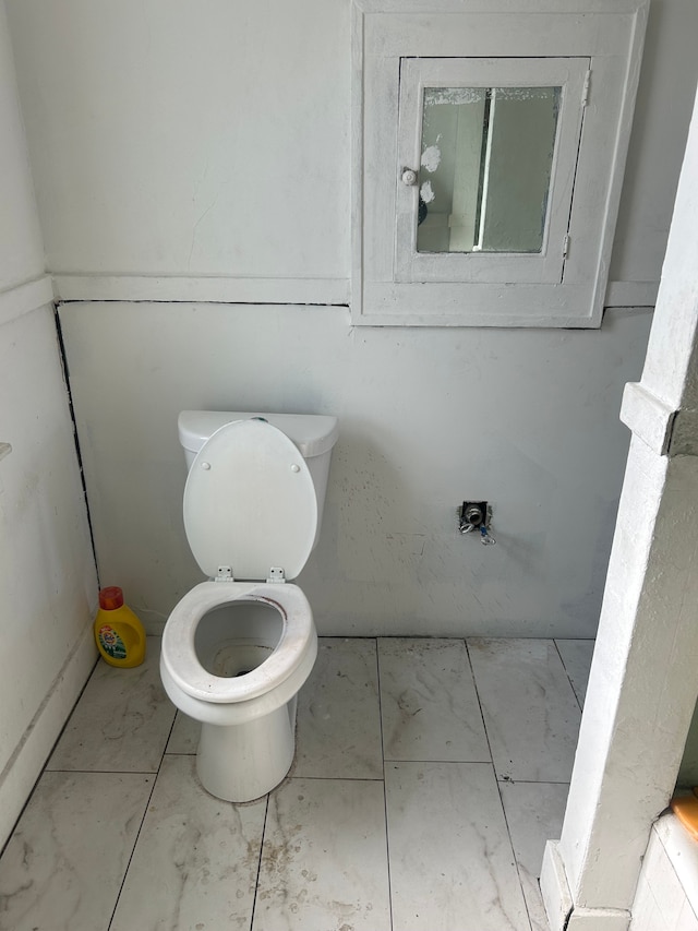 bathroom featuring toilet