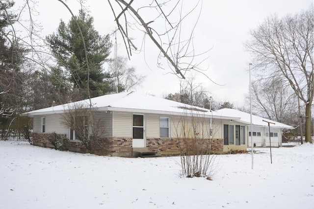 view of snow covered property