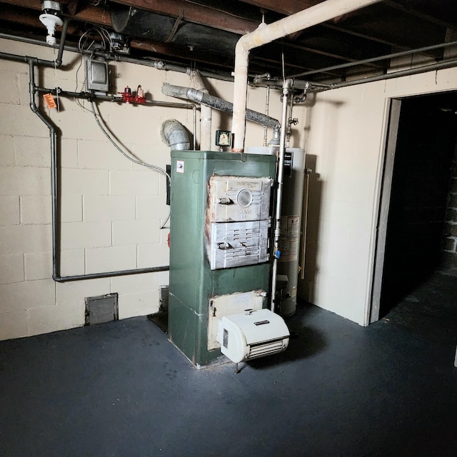 utility room with water heater