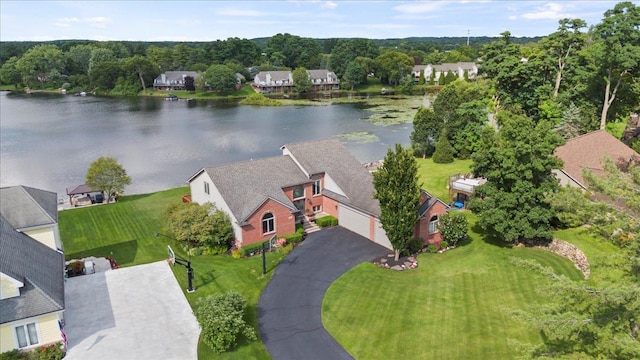 bird's eye view with a water view