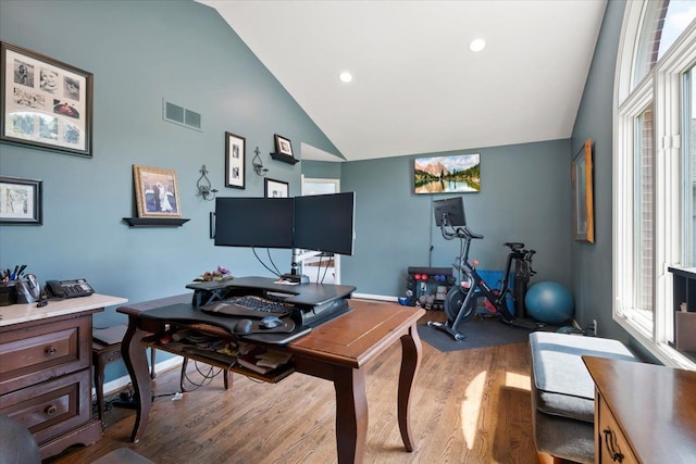 office featuring wood-type flooring and vaulted ceiling