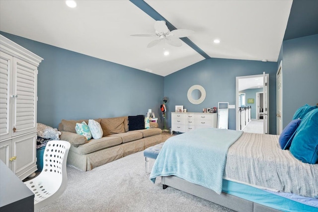 carpeted bedroom featuring ceiling fan and vaulted ceiling