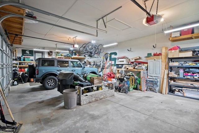 garage featuring a garage door opener