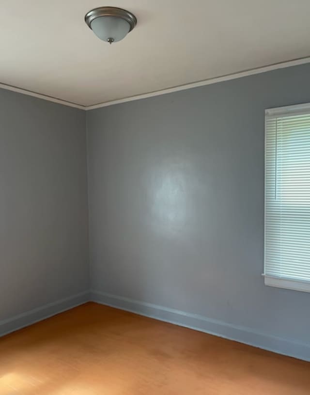 empty room with crown molding