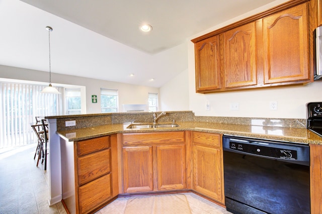 kitchen with stone counters, dishwasher, sink, lofted ceiling, and light wood-type flooring