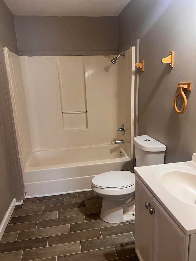 full bathroom with vanity, toilet, and bathtub / shower combination