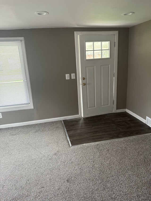 foyer featuring dark hardwood / wood-style floors