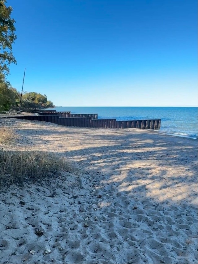 exterior space with a view of the beach and a water view