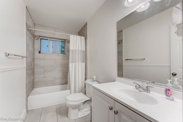 full bathroom featuring tile patterned flooring, vanity, shower / bath combination with curtain, and toilet