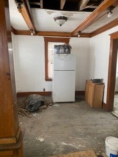 interior space featuring freestanding refrigerator