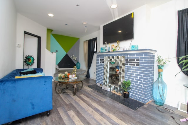 living room with dark hardwood / wood-style flooring