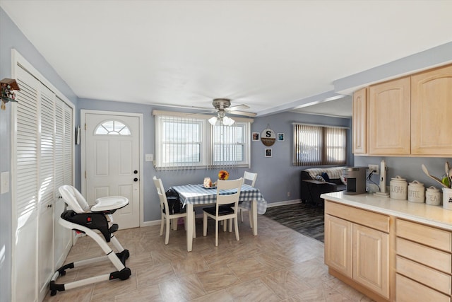 dining room with ceiling fan