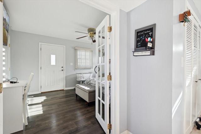 entryway featuring dark hardwood / wood-style flooring and ceiling fan