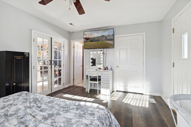 bedroom featuring ceiling fan, french doors, and dark hardwood / wood-style floors