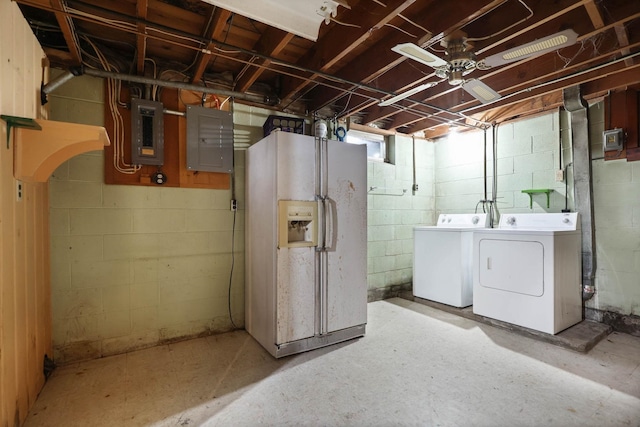 basement with washer and clothes dryer, ceiling fan, white refrigerator with ice dispenser, and electric panel