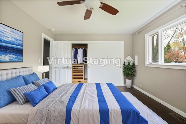 bedroom featuring dark hardwood / wood-style flooring, a closet, and ceiling fan