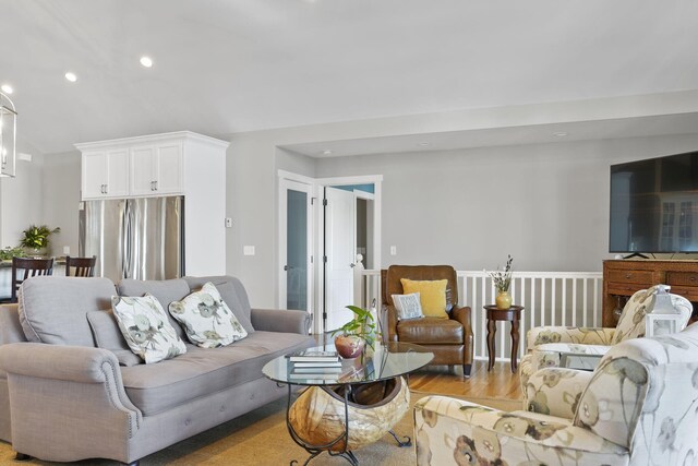 living area featuring recessed lighting and light wood-type flooring