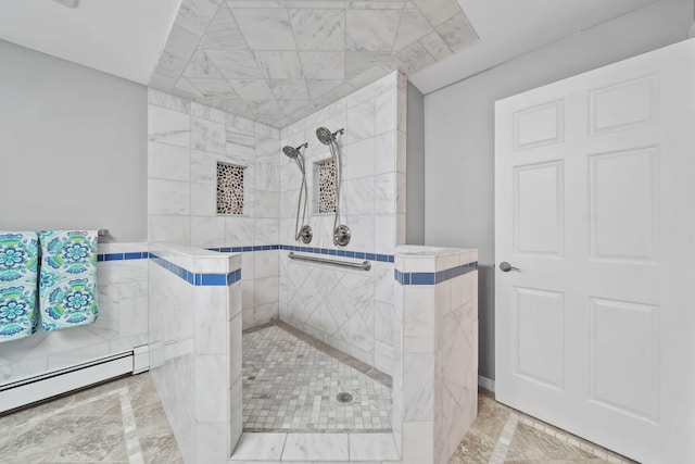 full bathroom with a baseboard heating unit and a tile shower