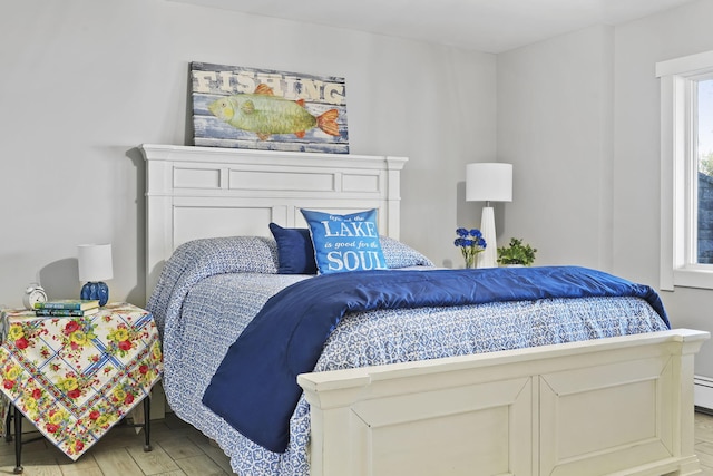 bedroom featuring light wood-type flooring