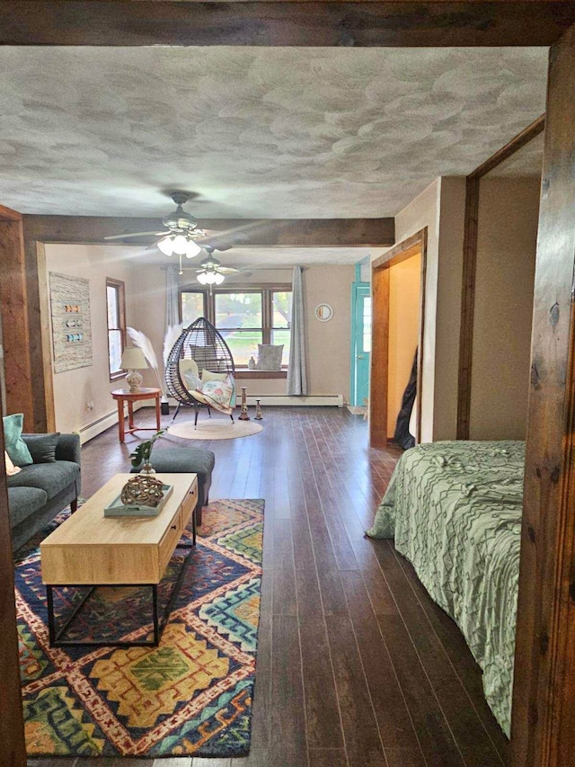 interior space featuring ceiling fan and dark wood-type flooring