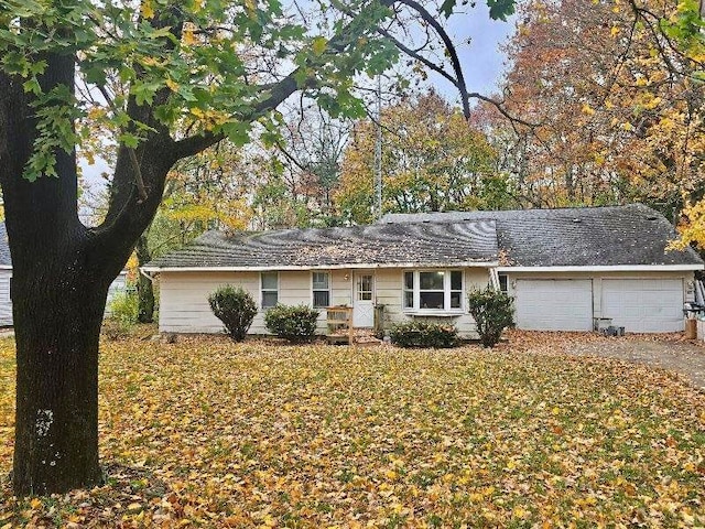 single story home with a garage