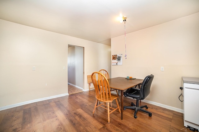 dining space featuring hardwood / wood-style floors