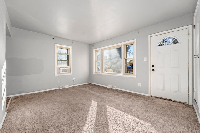 entryway with cooling unit and carpet floors