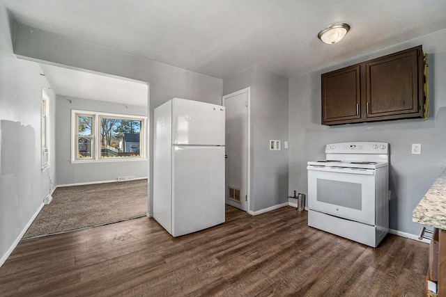 kitchen with dark brown cabinetry, dark wood-type flooring, and white appliances