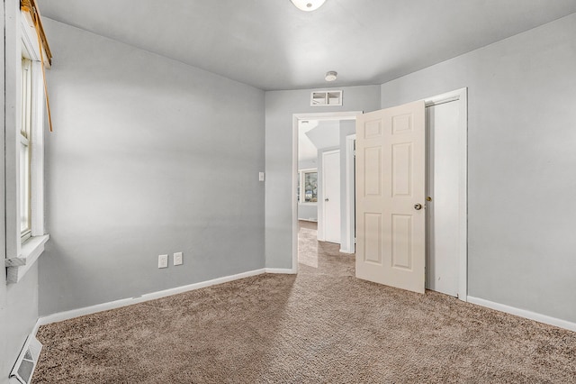 view of carpeted spare room